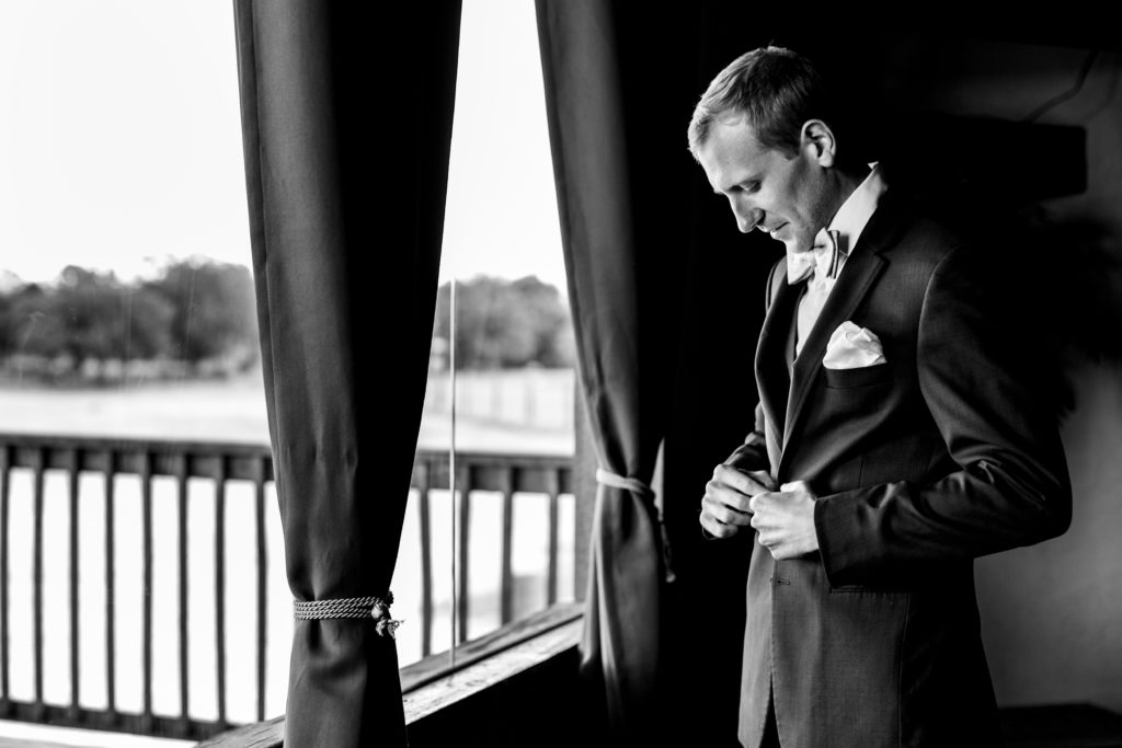 Groom getting ready at Bergheim Ranch in Boerne.  Photo by Shannon Cain Photography