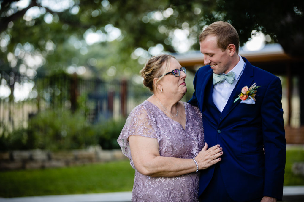 Mother of the groom and Groom have a sweet moment at Bergheim Ranch in Boerne.  Photo by Shannon Cain Photography