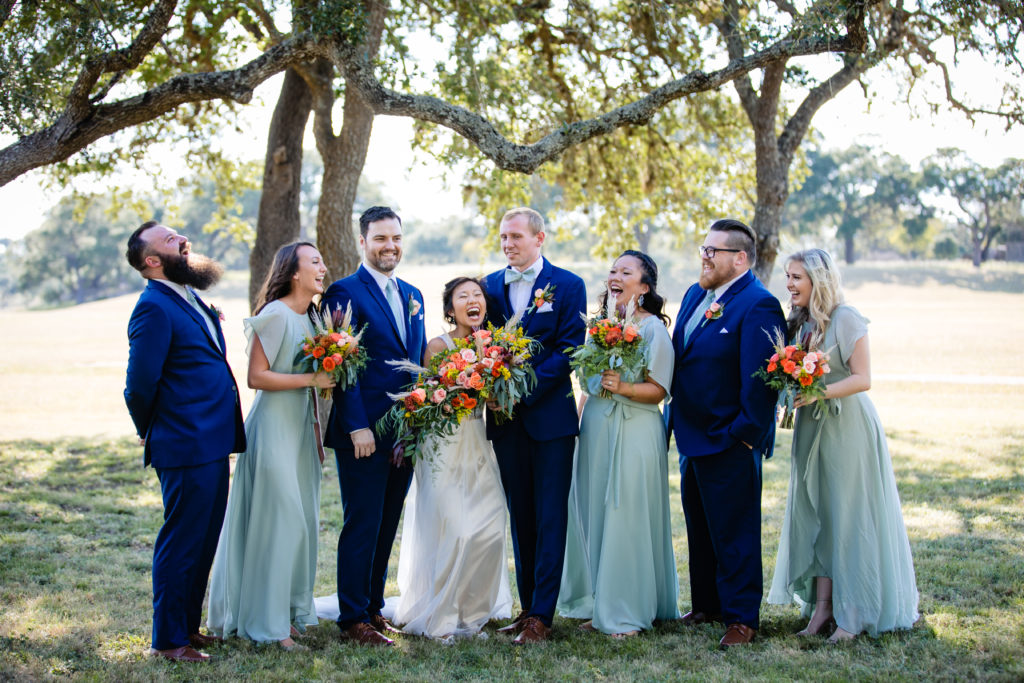 Bridal party shares laughter at Bergheim Ranch in Boerne.  Photo by Shannon Cain Photography