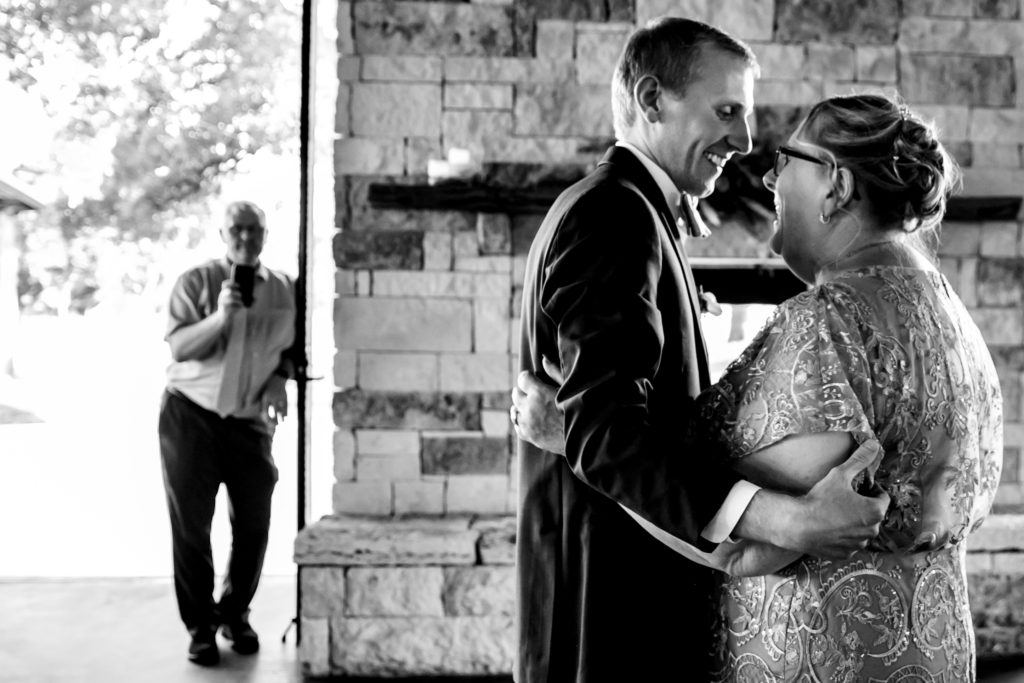 Mother of the Groom and Groom share a dance at Bergheim Ranch in Boerne.  Photo by Shannon Cain Photography