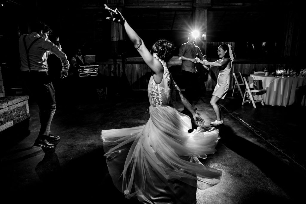 Wedding guests dance the night away at Bergheim Ranch in Boerne.  Photo by Shannon Cain Photography