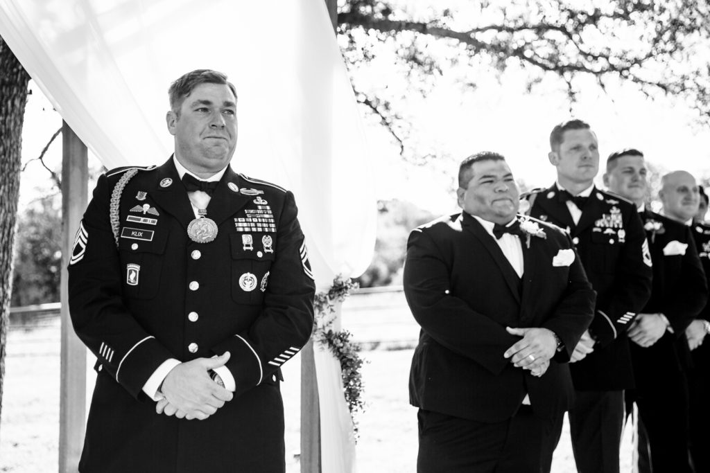 Bride and Military Groom get married at CW Ranch Hill Country Wedding Venue in Boerne, TX.  Photography by  Shannon Cain Photography.