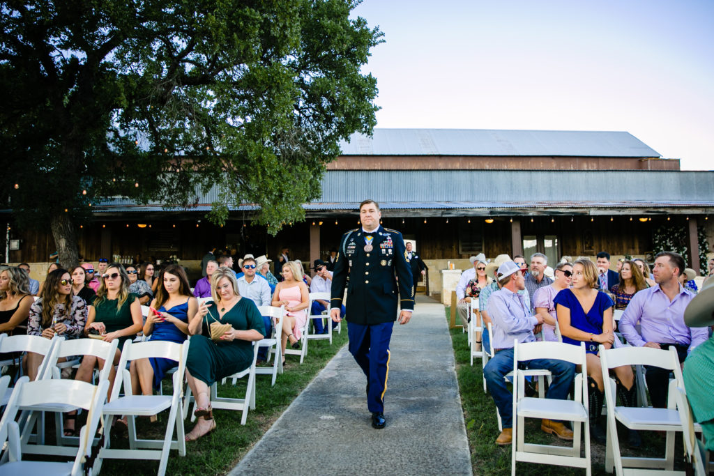 Bride and Military Groom get married at CW Ranch Hill Country Wedding Venue in Boerne, TX.  Photography by  Shannon Cain Photography.
