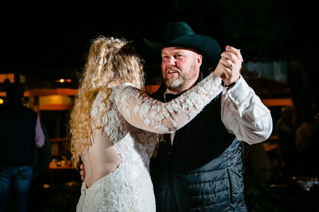 Bride and Groom get married at Perini Ranch Steakhouse in Buffalo Gap, TX near Abilene for a fall destination wedding.