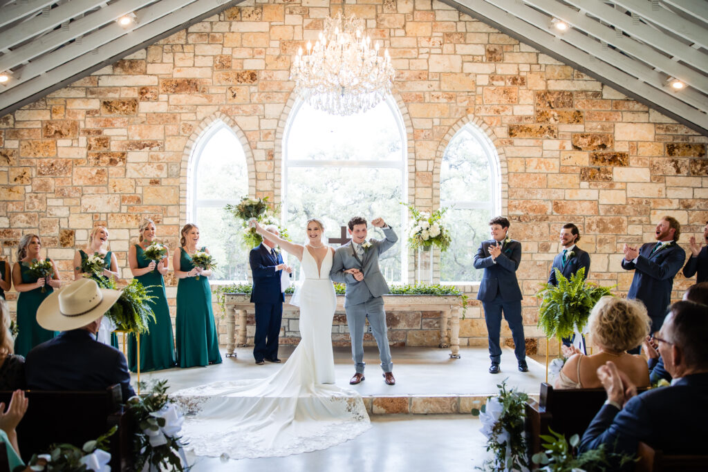 Bride and Groom get married in the little white chapel at The Chandelier of Gruene. Shannon Cain Photography